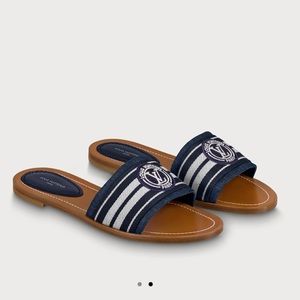 Louis Vuitton lock it flat mule